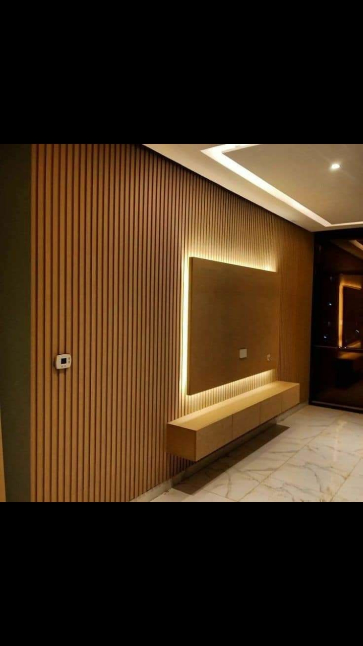 Warm Fluted Wood Media Wall